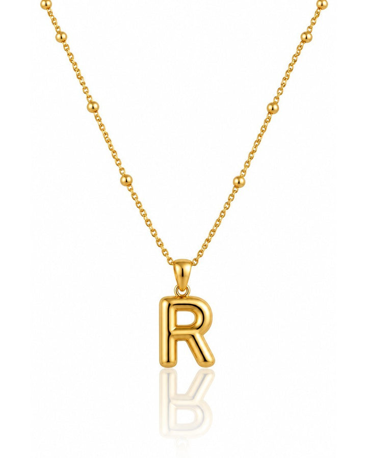 Elli Jewellery gold plated chunky letter R initial pendant necklace with a delicate beaded chain.