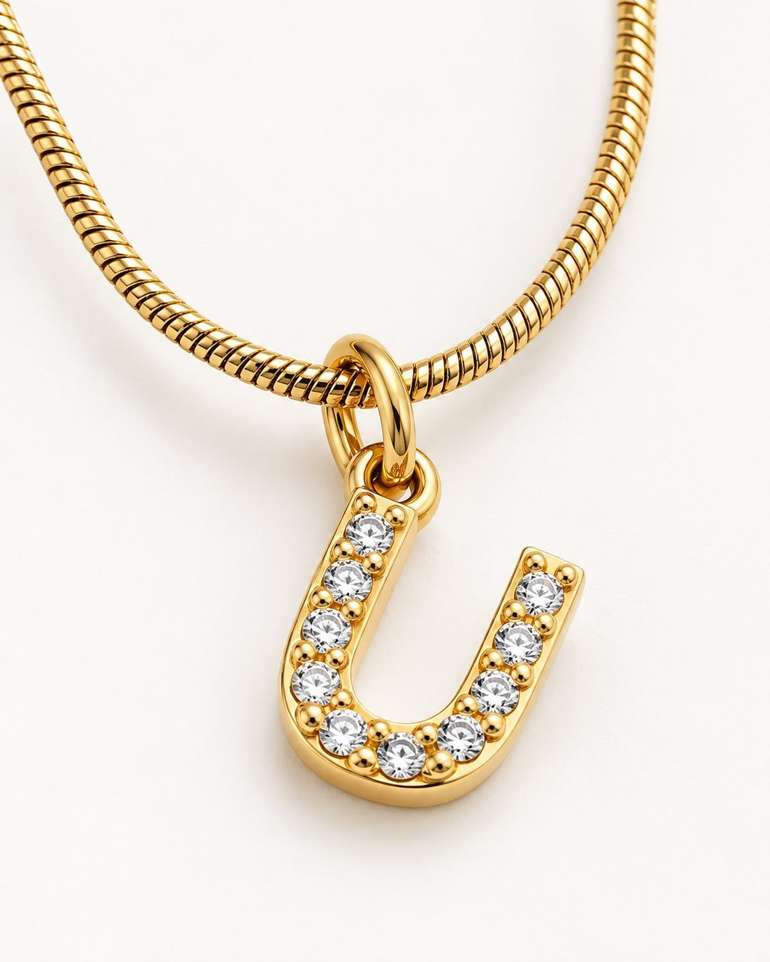Elli Jewellery gold plated letter U initial pendant necklace with sparkling crystals on a sleek snake chain