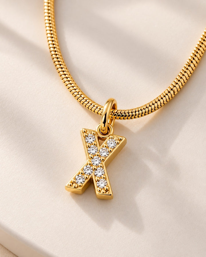 Elli Jewellery gold plated letter X initial pendant necklace with sparkling crystals on a delicate snake chain