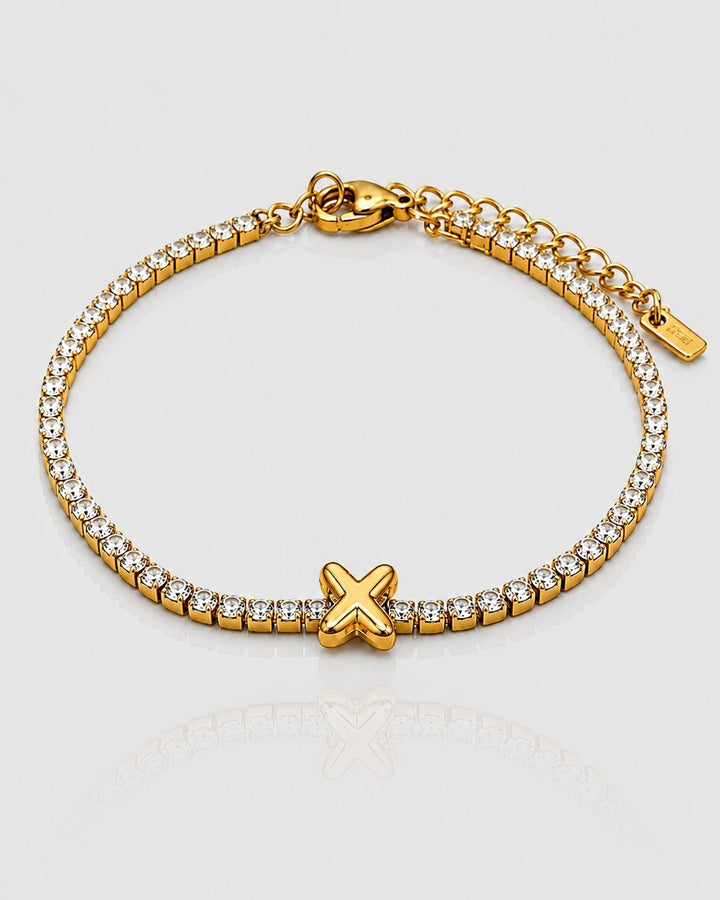 Elli Jewellery gold plated tennis bracelet featuring a central letter X charm and sparkling clear crystals