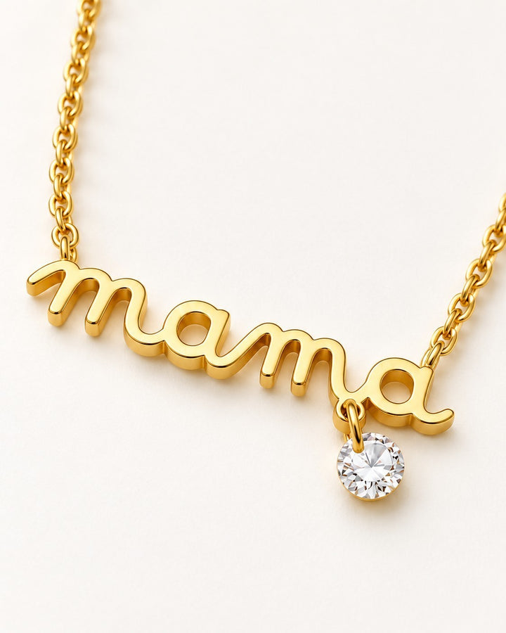Elli Jewellery gold plated MAMA script pendant necklace with a dainty cursive font and a small sparkling crystal charm.