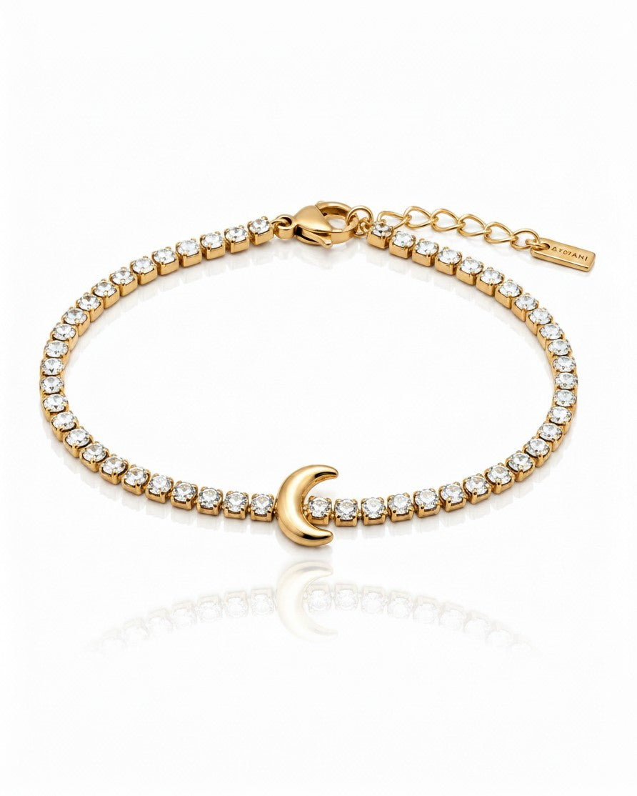 Elli Jewellery gold plated tennis bracelet featuring a delicate crescent moon charm and sparkling clear crystals.