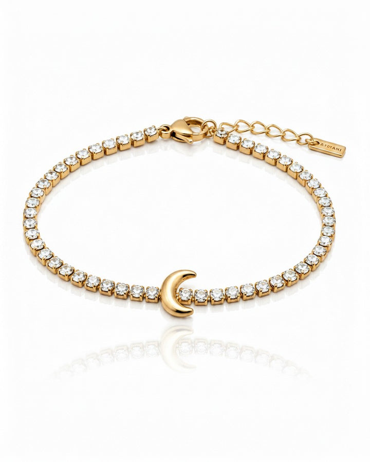 Elli Jewellery gold plated tennis bracelet featuring a delicate crescent moon charm and sparkling clear crystals.