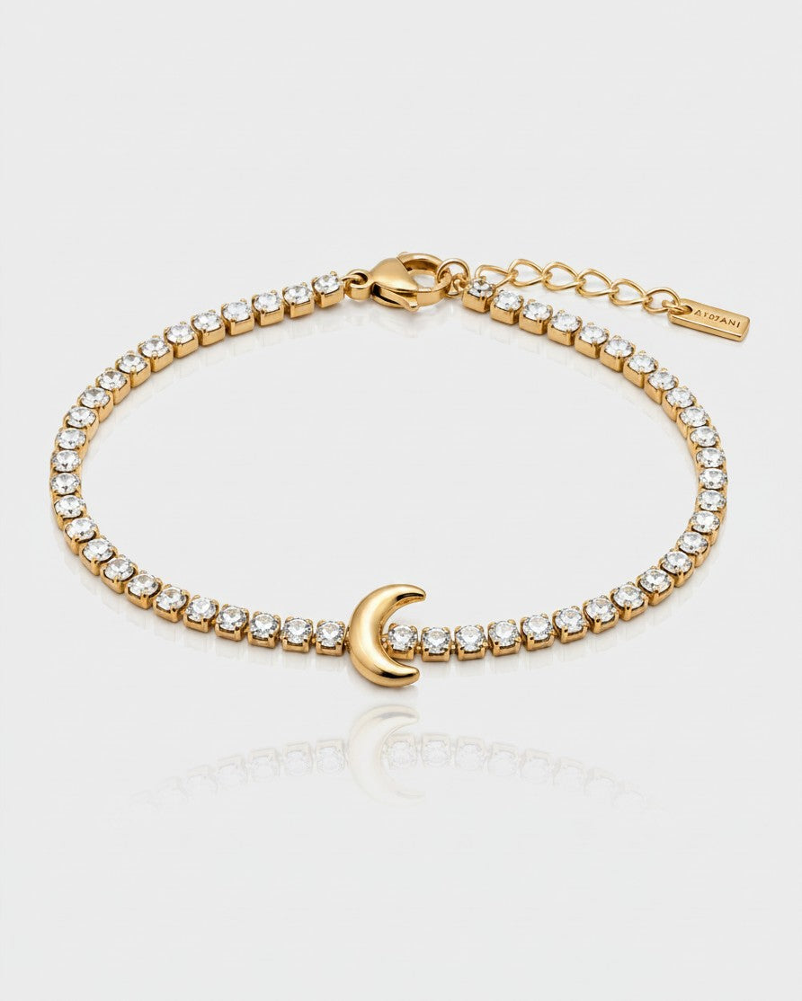 Elli Jewellery gold plated tennis bracelet featuring a delicate crescent moon charm and sparkling clear crystals.
