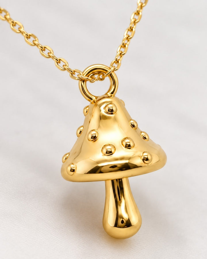 Elli Jewellery gold plated mushroom charm pendant necklace with a polished finish on a delicate chain