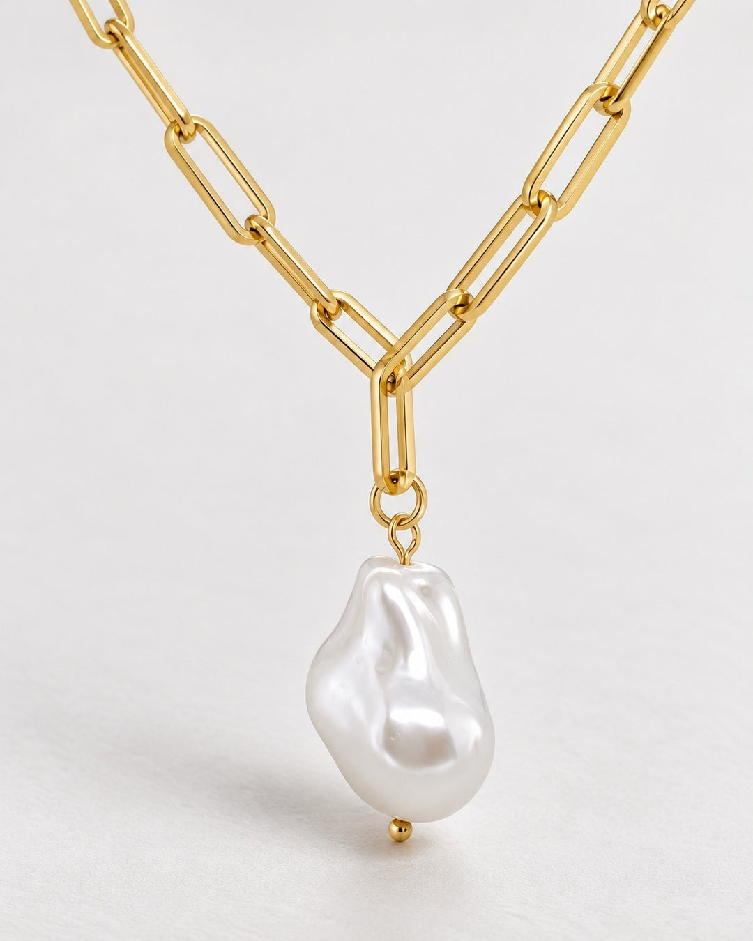 Elli Jewellery gold plated paperclip chain necklace featuring a large irregular white faux pearl pendant