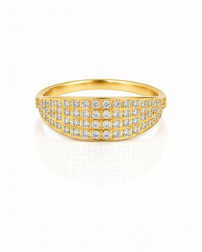 Elli Jewellery gold plated waterproof ring featuring a wide band with pavé set crystals on a white background.