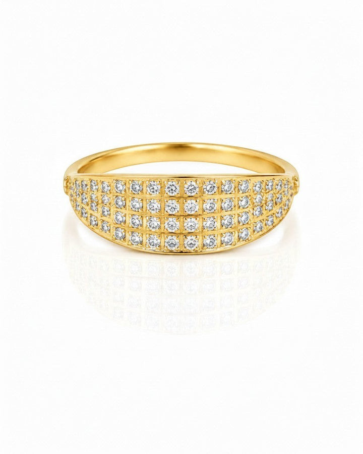 Elli Jewellery gold plated waterproof ring featuring a wide band with pavé set crystals on a white background.