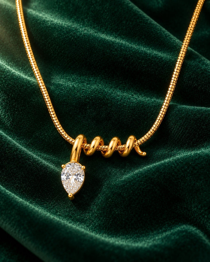 Elli Jewellery gold plated waterproof necklace with a pear shaped diamante crystal pendant on a spiral chain