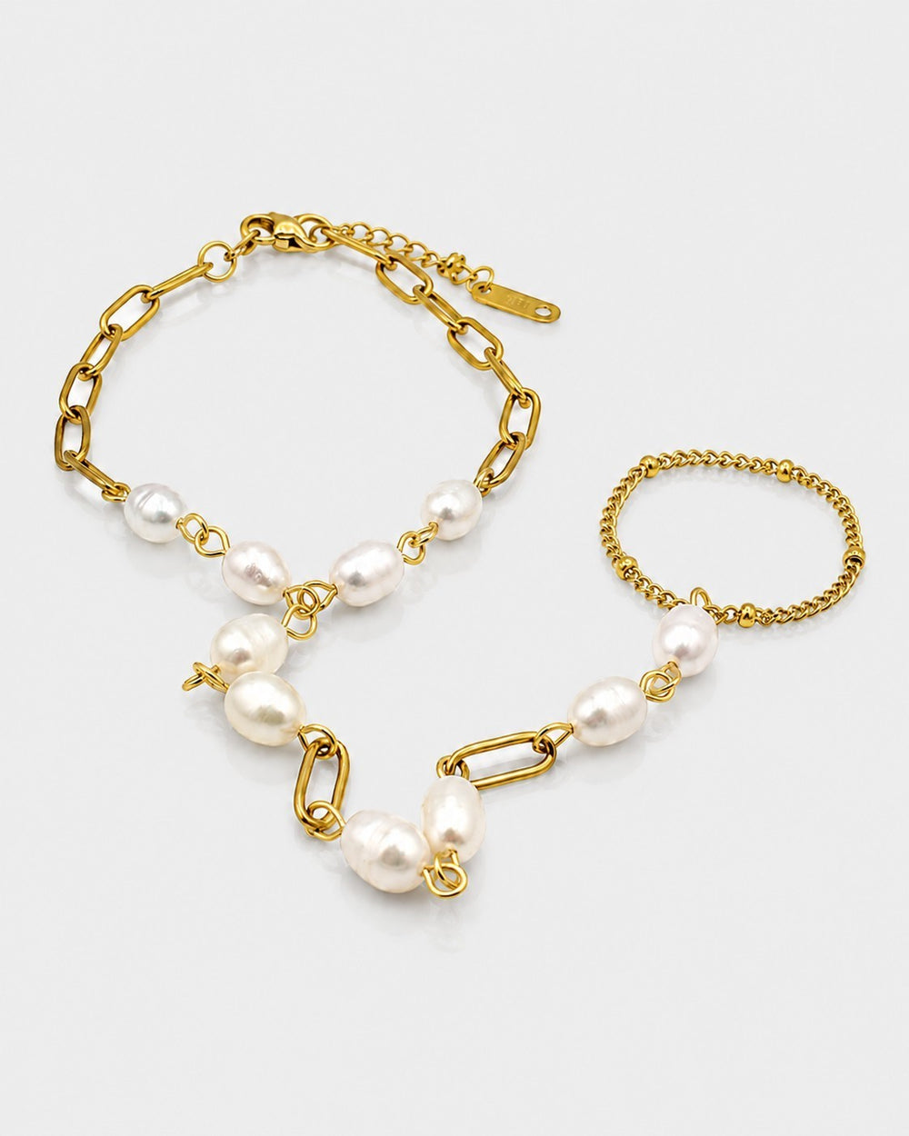 Elli Jewellery gold plated waterproof hand chain bracelet with lustrous pearl embellishments and adjustable ring