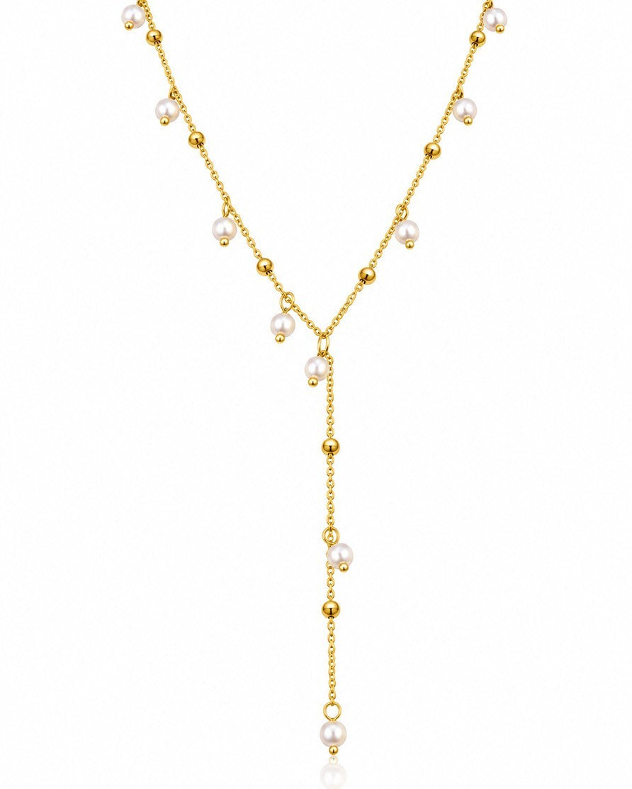 Elli Jewellery gold plated waterproof lariat necklace featuring delicate chain, gold beads, and lustrous pearl drops.