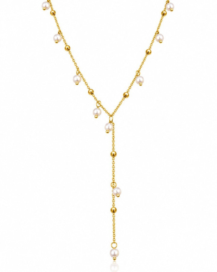 Elli Jewellery gold plated waterproof lariat necklace featuring delicate chain, gold beads, and lustrous pearl drops.