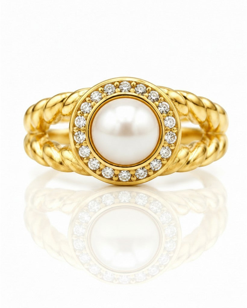 Elli Jewellery gold plated ring featuring a central pearl surrounded by zirconia pavé and a twisted rope band design.