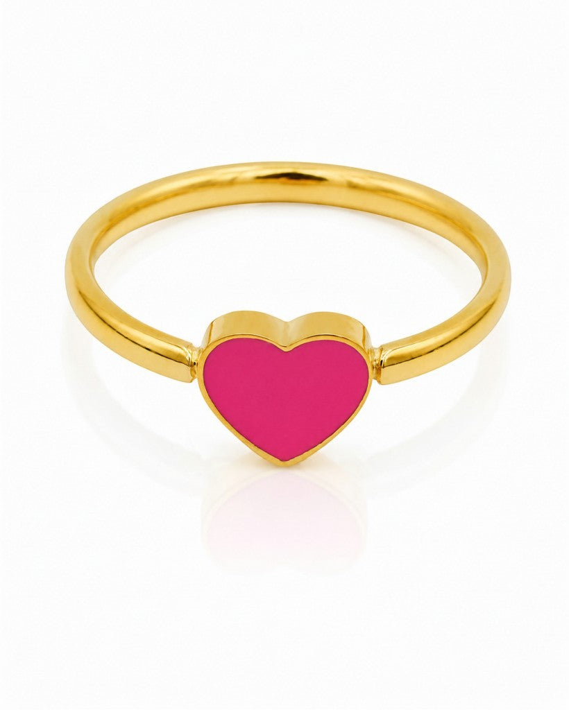 Elli Jewellery gold plated ring featuring a vibrant pink enamel heart design on a polished band