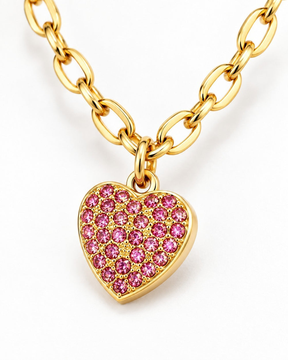 Elli Jewellery gold plated necklace featuring a heart pendant encrusted with sparkling pink diamante crystals.