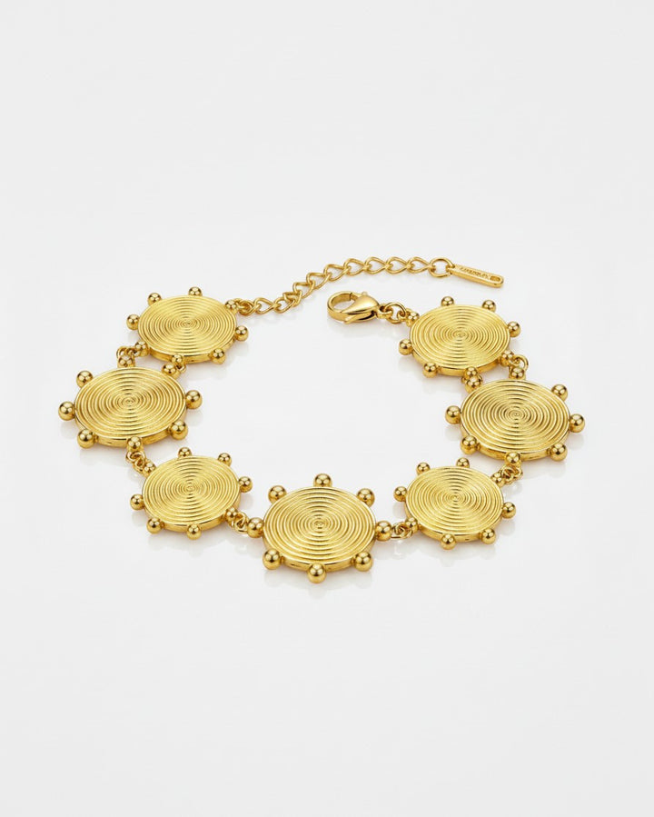 Elli Jewellery gold plated waterproof bracelet featuring circular textured charms with delicate bead accents
