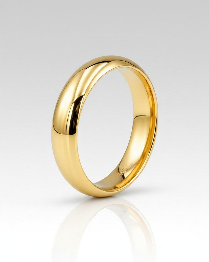 Elli Jewellery gold plated waterproof slim 1cm bangle bracelet with a polished finish on a white background