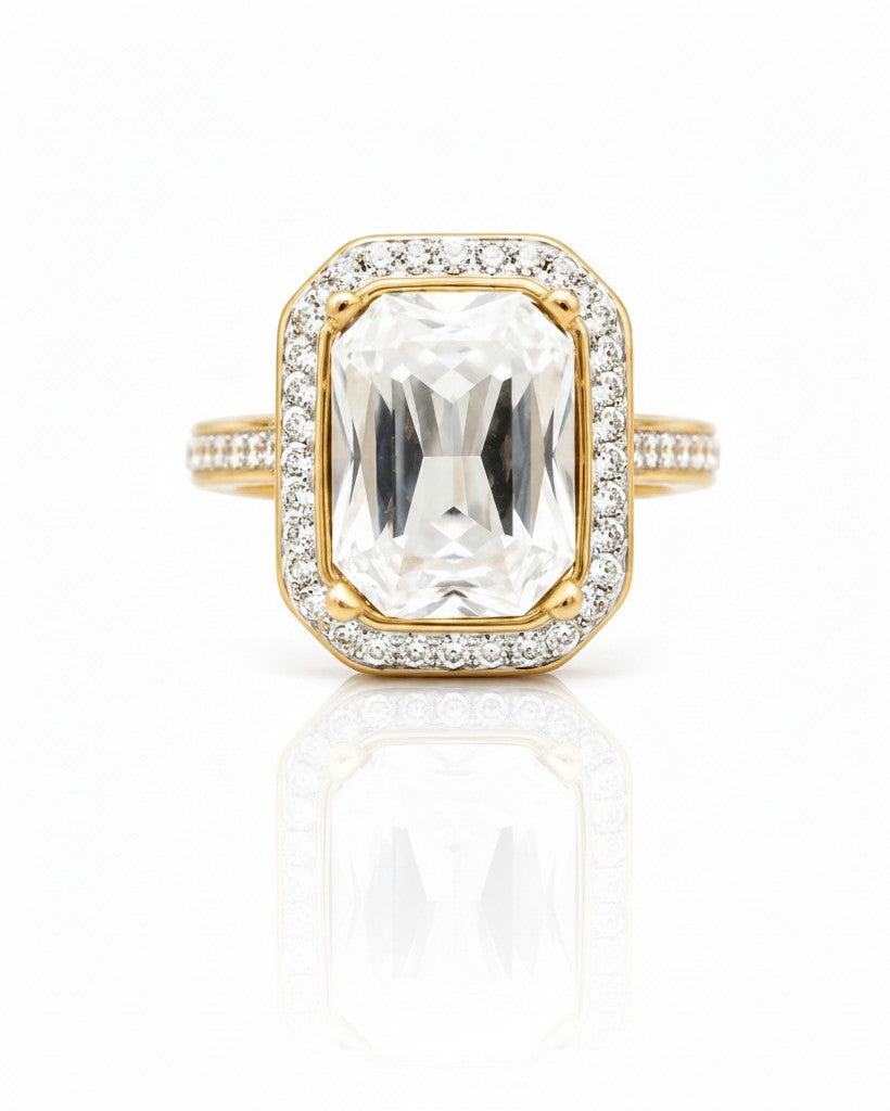 Elli Jewellery gold plated chunky ring featuring a large rectangular clear crystal surrounded by pavé stones.