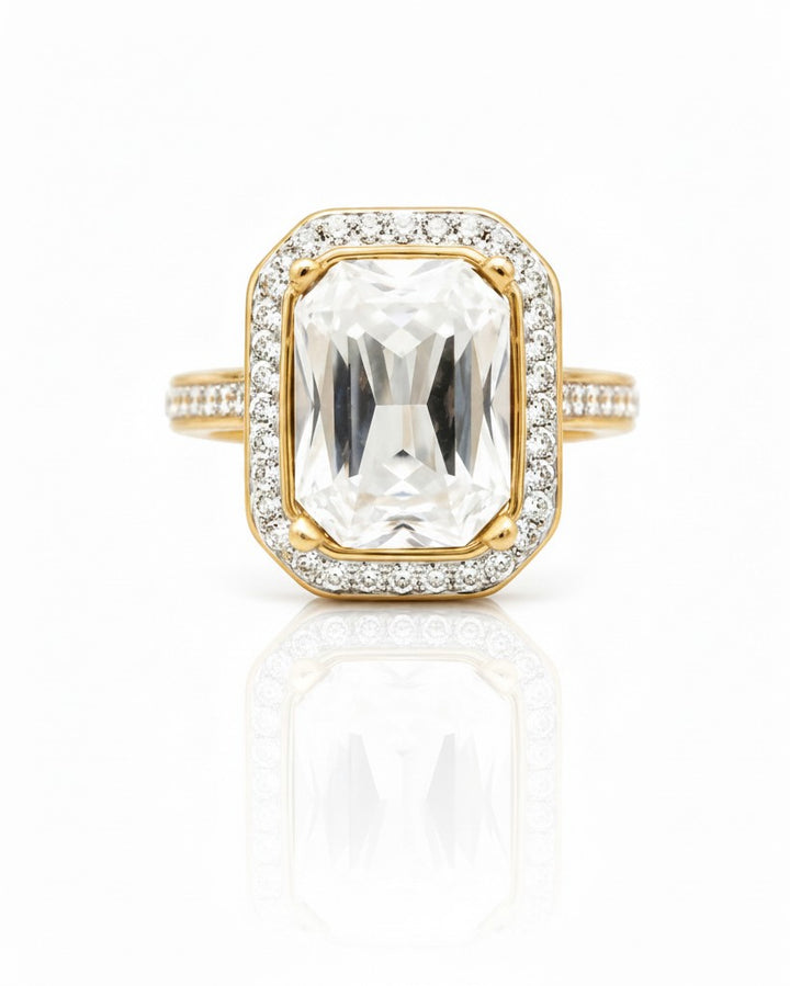 Elli Jewellery gold plated chunky ring featuring a large rectangular clear crystal surrounded by pavé stones.