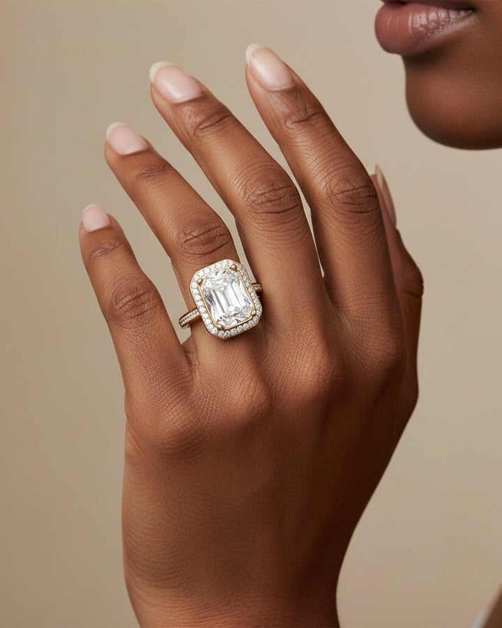Elli Jewellery gold plated chunky ring featuring a large rectangular clear crystal with a pavé halo setting