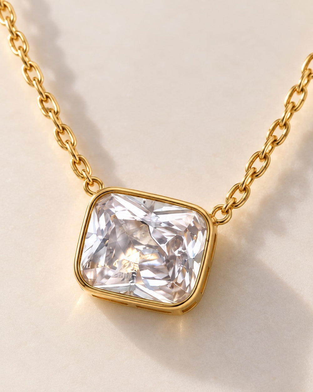 Elli Jewellery gold plated rectangular pendant necklace featuring a sparkling cubic zirconia stone on a delicate chain