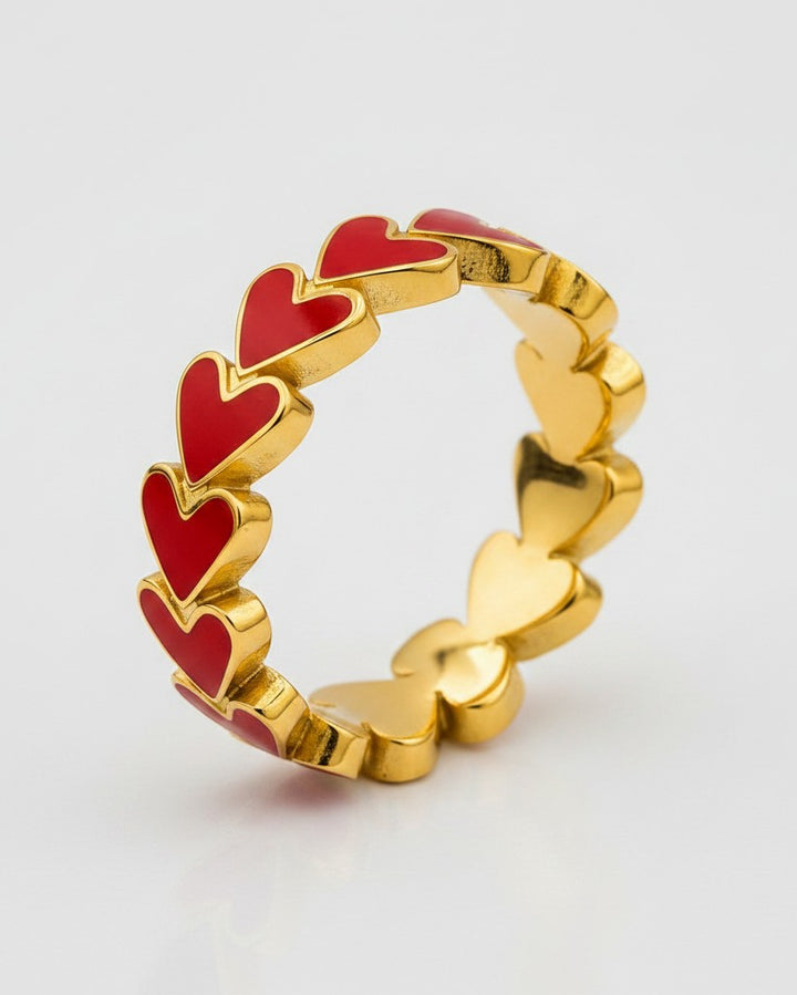 Elli Jewellery gold plated ring featuring a cluster of vibrant red enamel hearts in a glossy finish.