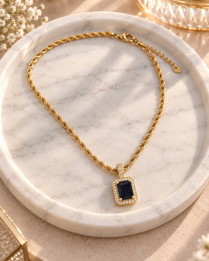 Elli Jewellery gold plated rope chain necklace with a rectangular black cubic zirconia pendant and crystal halo.