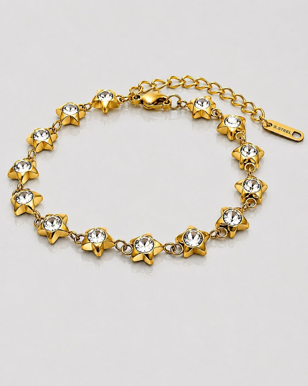 Elli Jewellery gold plated star charm bracelet featuring sparkling cubic zirconia stones and an adjustable clasp.