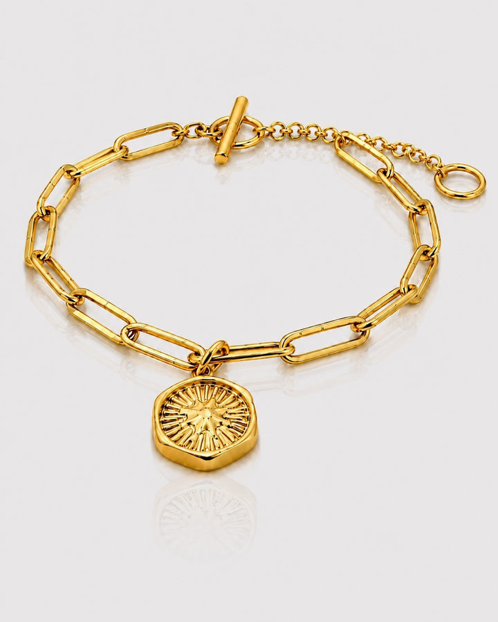 Elli Jewellery gold plated waterproof bracelet featuring a celestial starburst charm on a chunky link chain