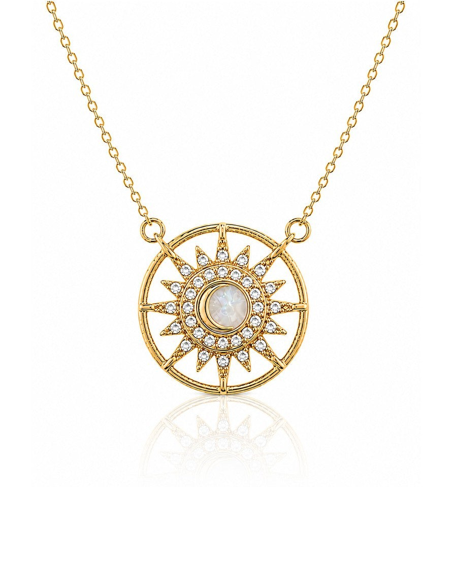 Elli Jewellery gold plated starburst medallion pendant necklace with a cream cabochon center and crystal accents.