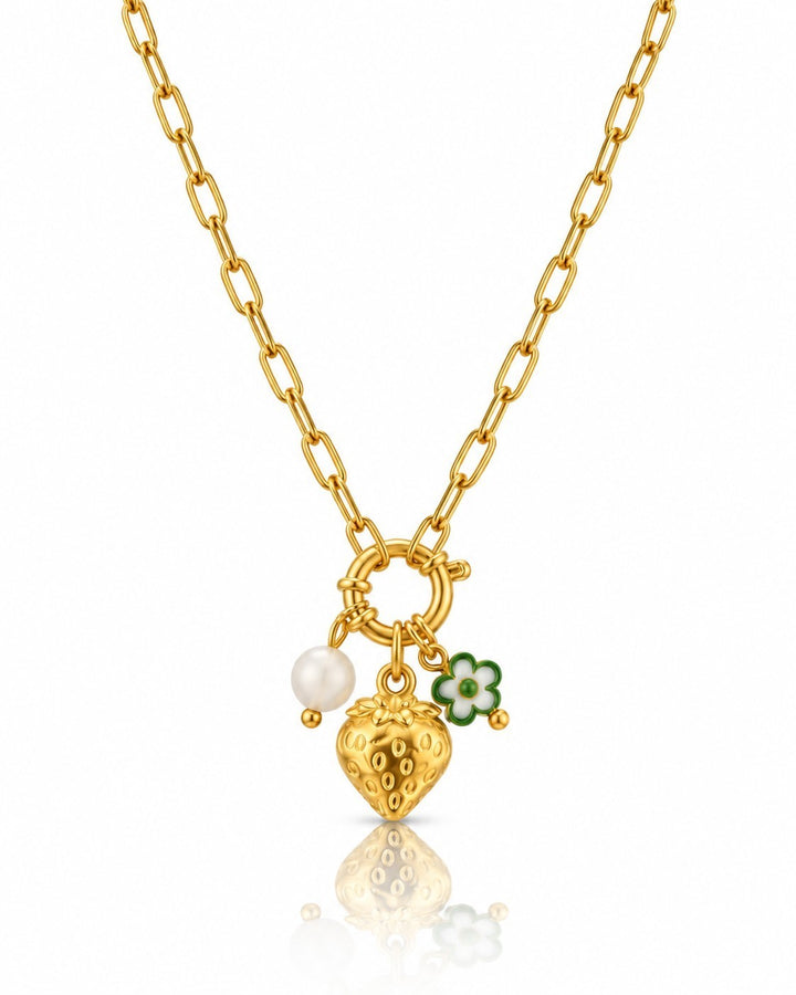 Elli Jewellery gold plated chain necklace featuring a strawberry charm, a small pearl, and a green and white flower.