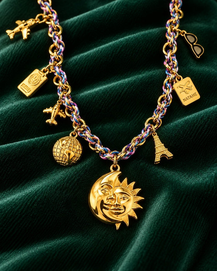 Elli Jewellery gold plated charm necklace featuring a sun and moon pendant on a multi-colored braided chain