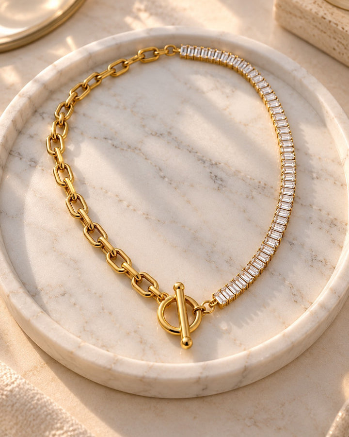 Elli Jewellery gold plated necklace featuring a half chain and half baguette zirconia crystal design with a T-bar clasp