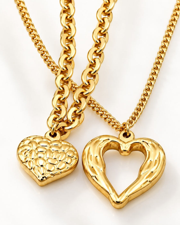 Elli Jewellery gold plated waterproof necklaces featuring a textured solid heart and an open heart pendant design.