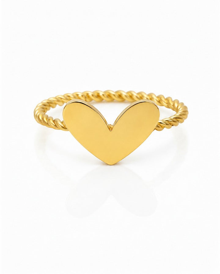 Elli Jewellery gold plated dainty heart ring with a textured twisted rope band on a white background.