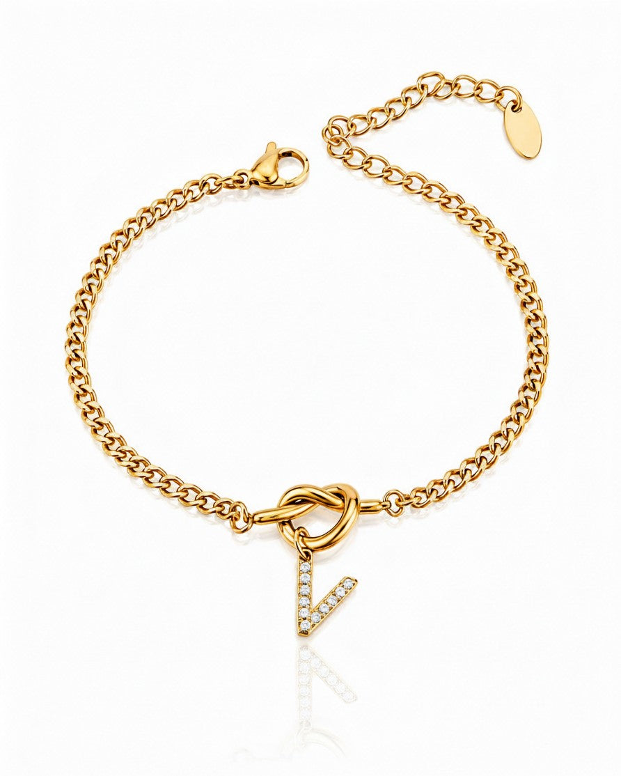 Elli Jewellery gold plated chain bracelet featuring a V-shaped diamante charm with clear crystals on a white background