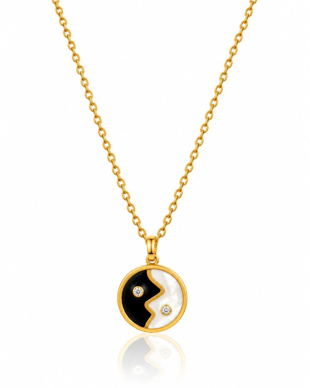 Elli Jewellery gold plated yin yang pendant necklace with black and white enamel and small sparkling crystal accents.