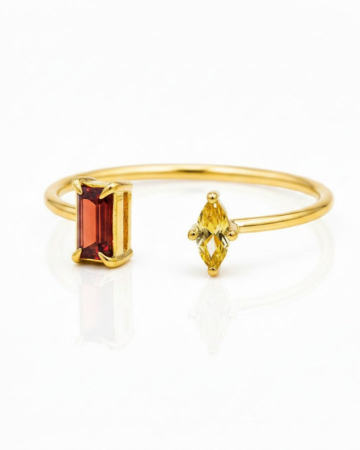 Elli Jewellery gold-plated open stacking ring featuring a rectangular red and marquise yellow zirconia stone.