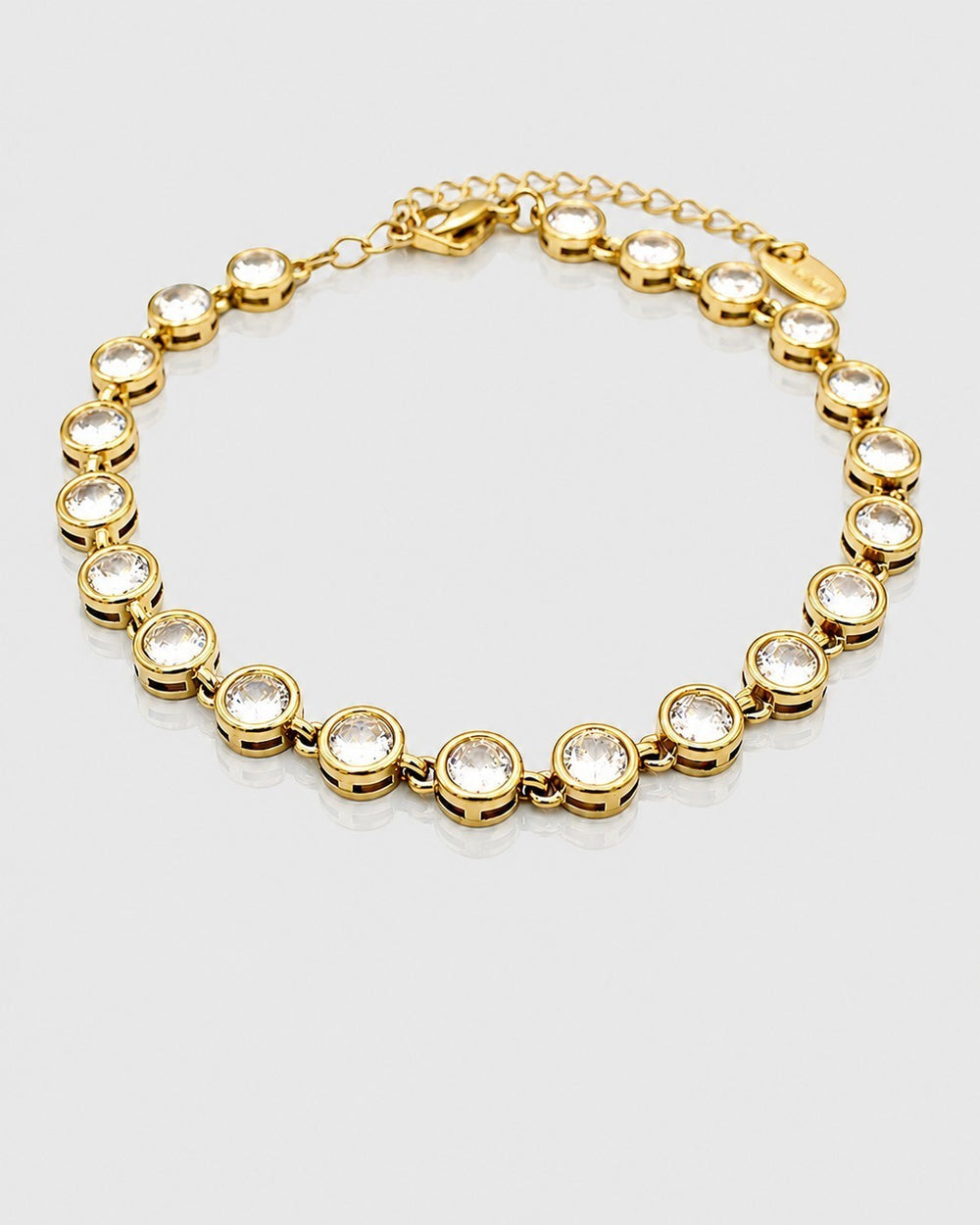 Elli Jewellery gold plated tennis bracelet featuring a continuous row of round-cut clear zirconia stones