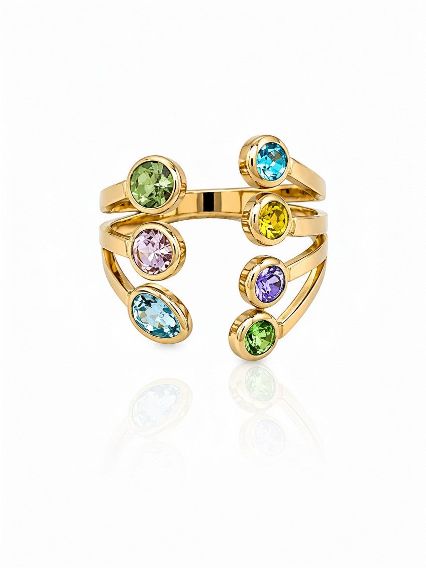 Elli Jewellery gold plated statement ring featuring seven vibrant bezel-set multi-coloured crystals on a spiral band.