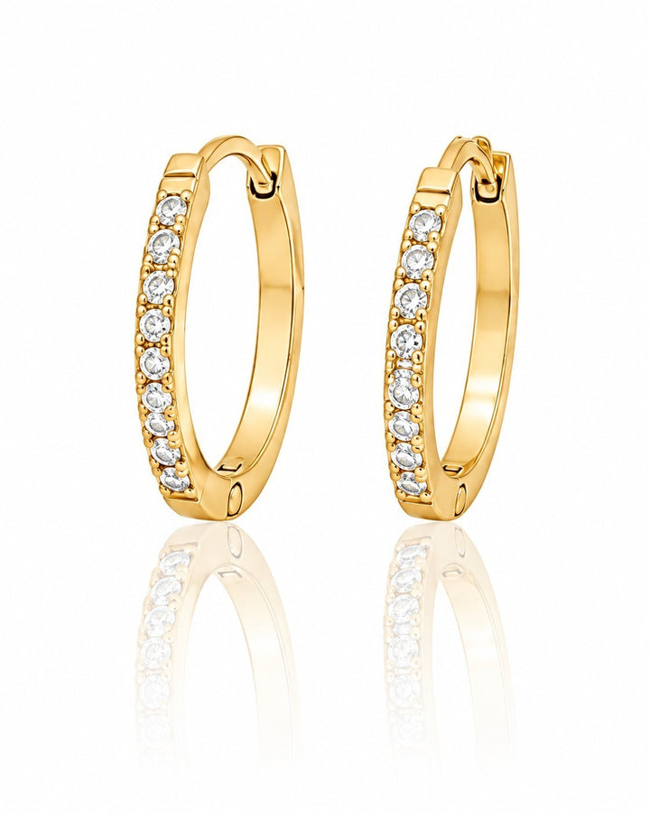 Elli Jewellery gold plated hoop earrings featuring a row of clear pavé crystals with a secure hinged closure.