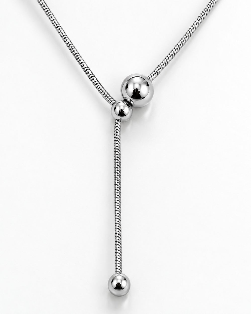 Elli Jewellery rhodium plated waterproof ball chain necklace with a sleek lariat design on a white background