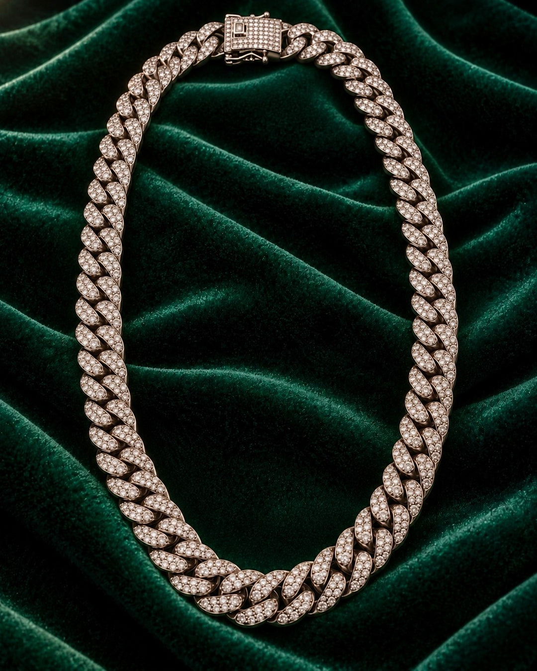 Elli Jewellery rhodium plated chunky curb chain necklace with sparkling crystal embellishments on green velvet