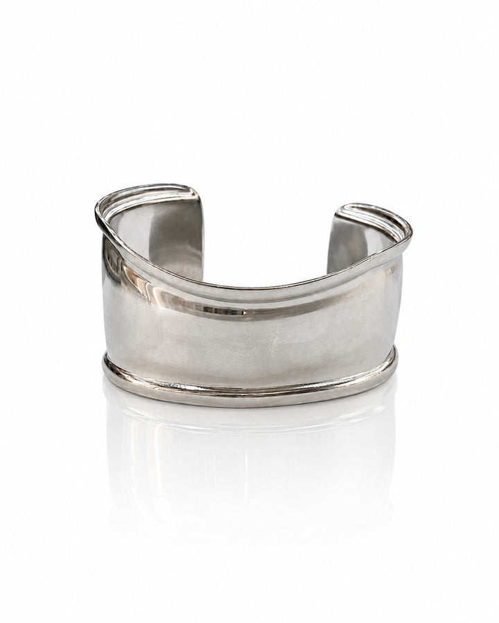 Elli Jewellery rhodium plated minimalist curved bangle bracelet with a polished silver-toned finish.