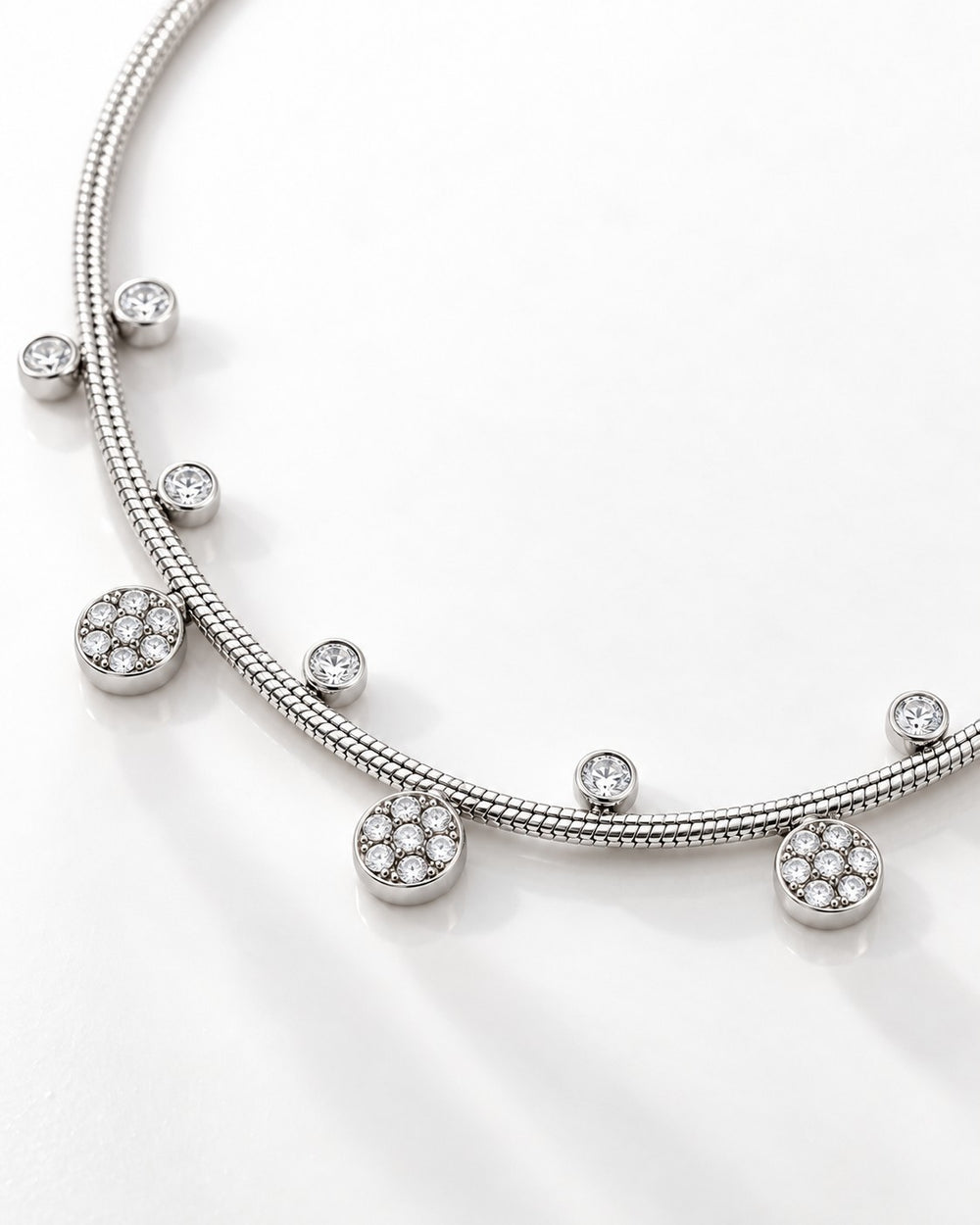 Elli Jewellery rhodium plated necklace featuring delicate round floral pendants with sparkling crystals