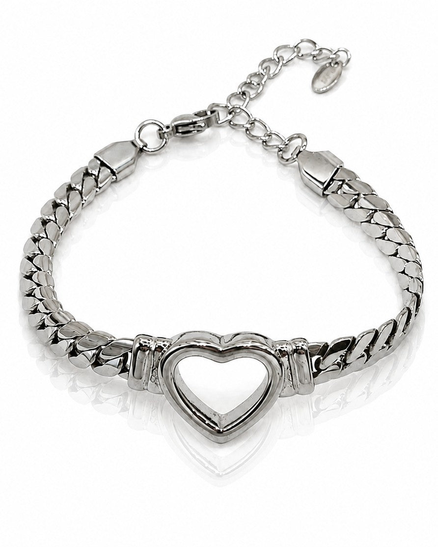 Elli Jewellery rhodium plated Cuban link bracelet featuring a central open heart charm on a white background