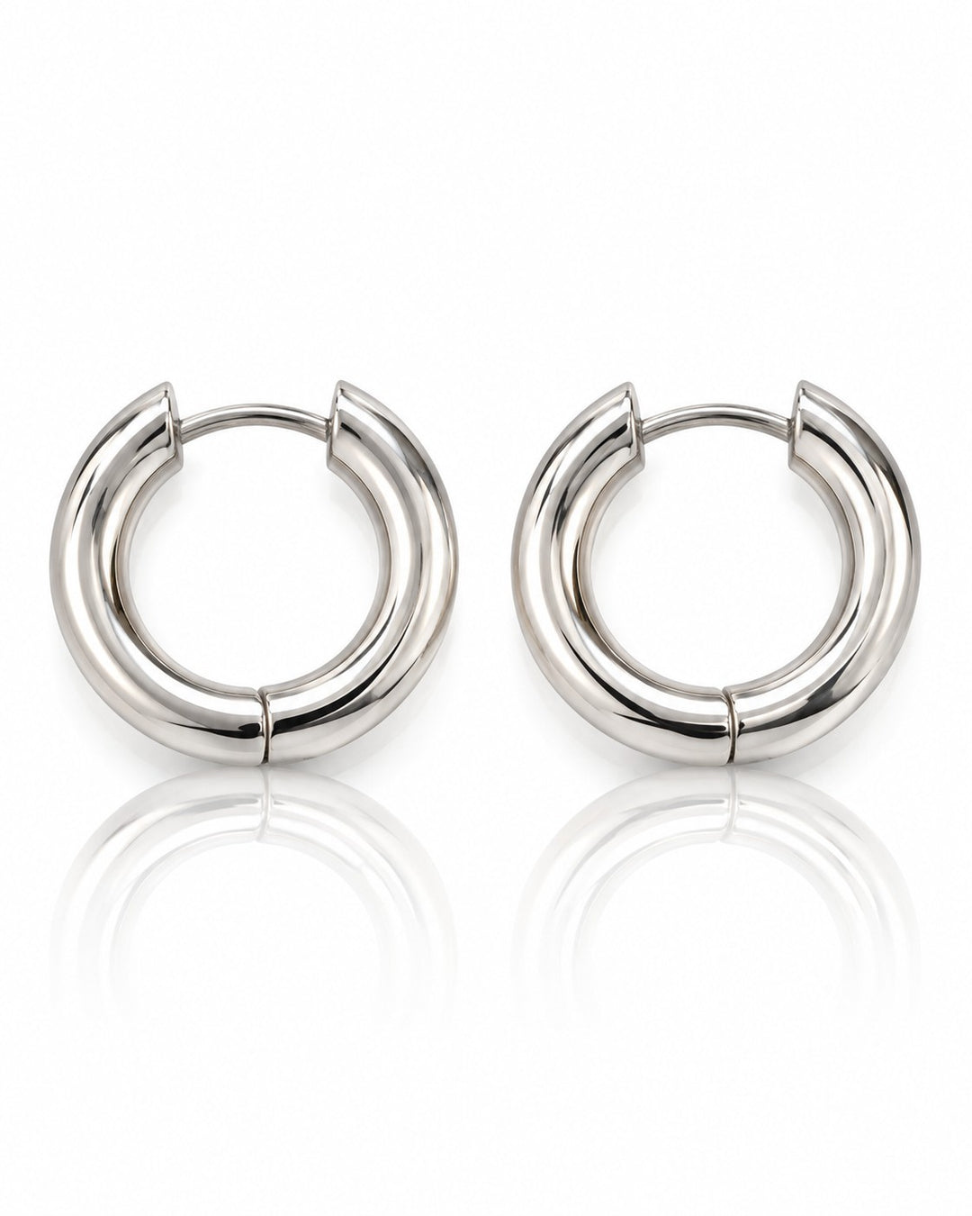 Elli Jewellery rhodium plated waterproof mid huggie hoop earrings with a polished silver finish on a white background.