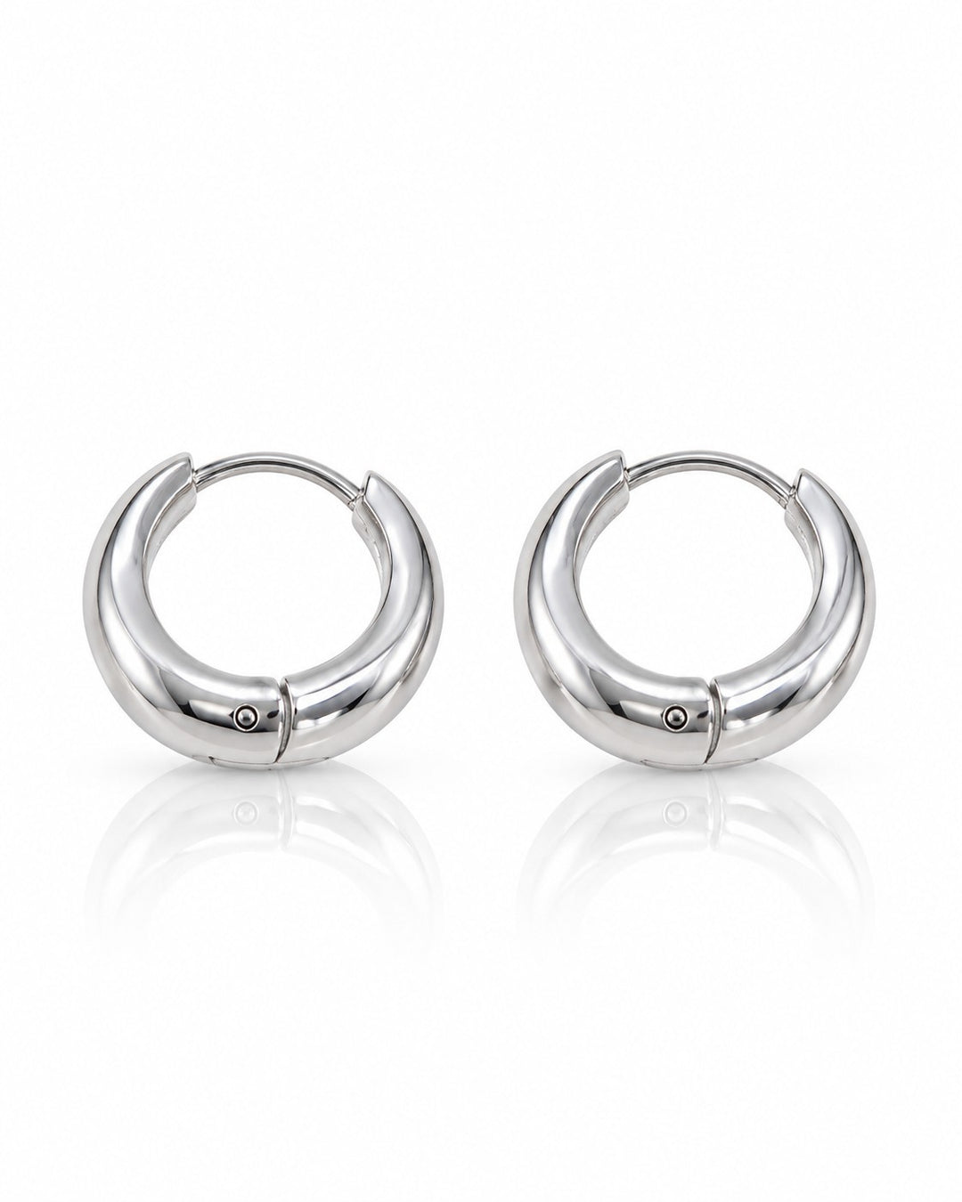 Elli Jewellery rhodium plated minimalist huggie hoop earrings with a polished silver finish and secure hinged clasp.