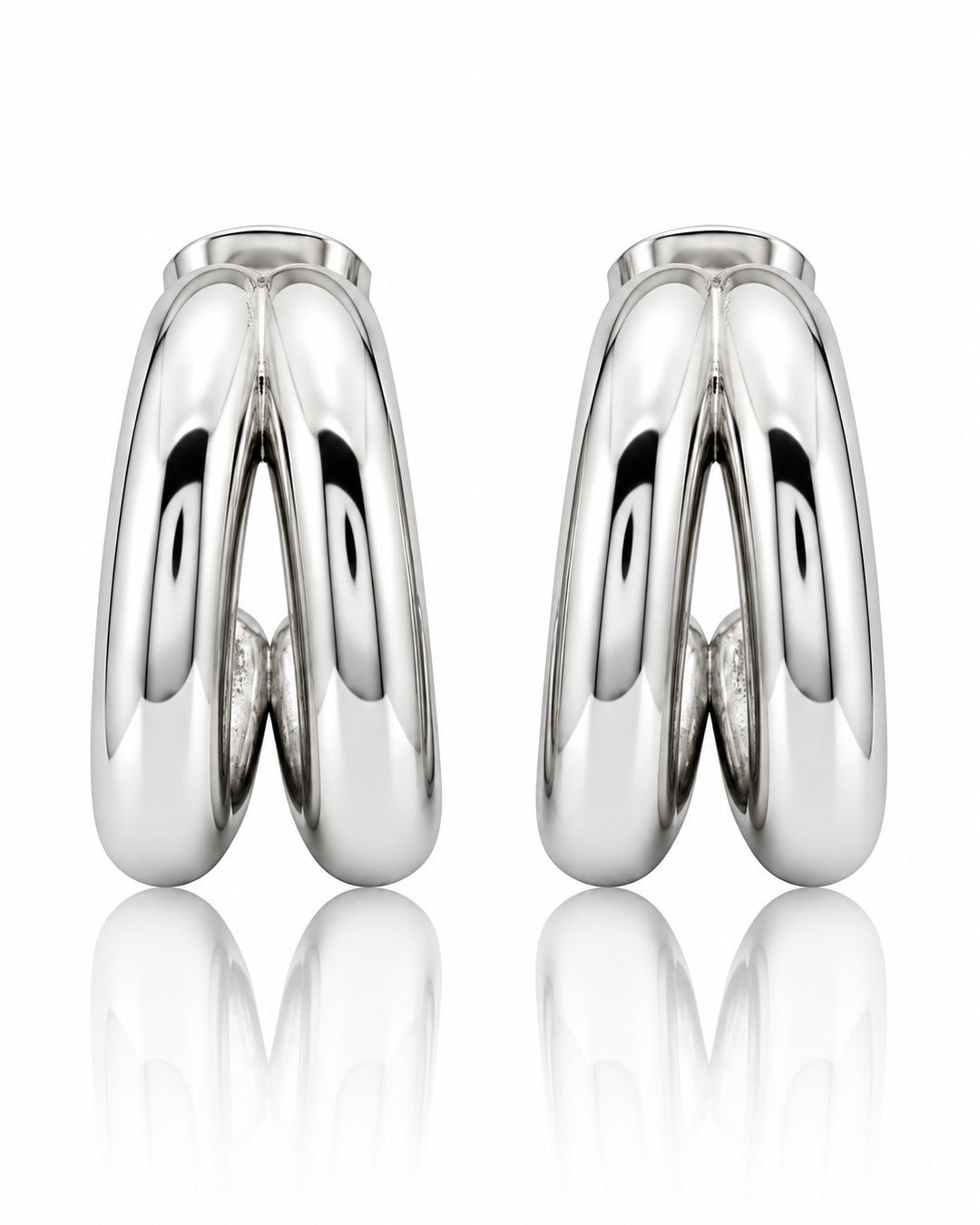 Elli Jewellery rhodium plated hollow C-shaped hoop earrings with a polished silver-tone finish on a white background