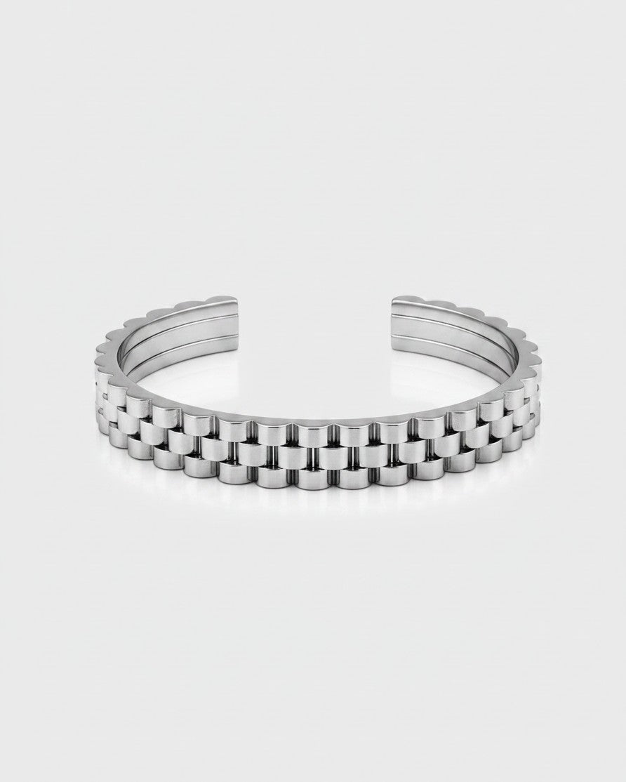 Elli Jewellery rhodium plated cuff bangle with a textured link-style design in a polished silver-toned finish.